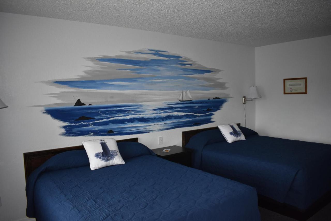 Lighthouse Cove Inn Бандон Экстерьер фото A room at the motel